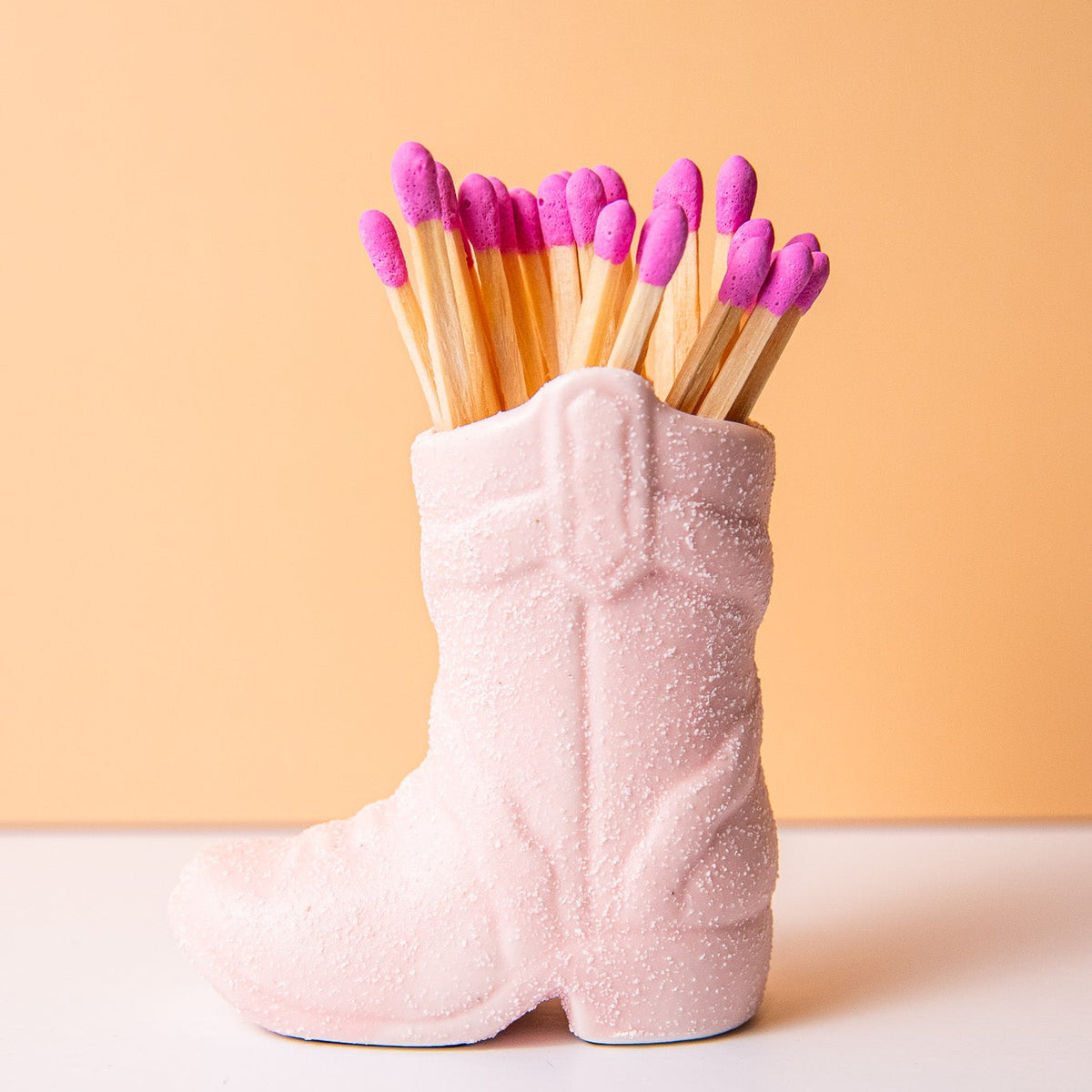 Hot pink matches with boot match holder