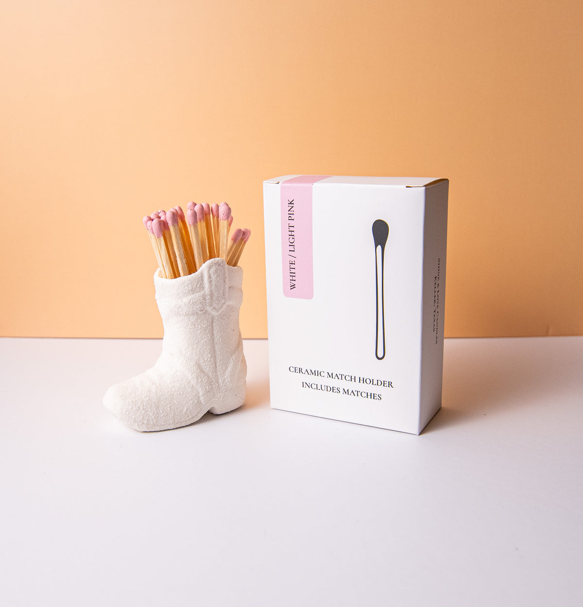 Ceramic match holder with color matches 